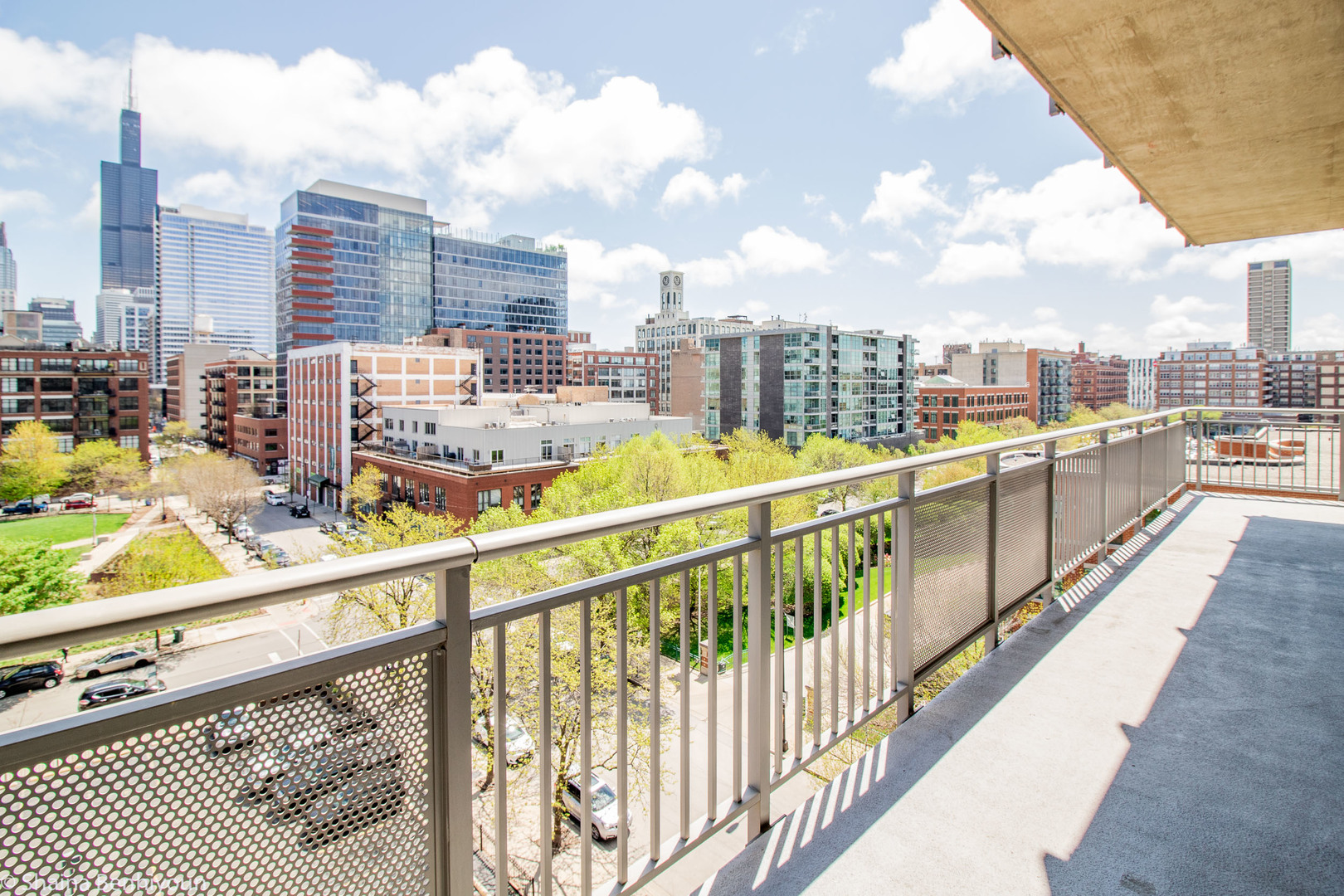 111 South Morgan Street, Unit 715 Chicago, IL 60607 - Photo 16 of 17 a view of city from a balcony