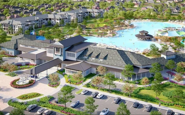 an aerial view of residential house with outdoor space and lake view