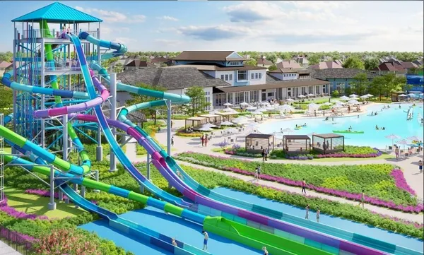 a view of a park with swings and slides