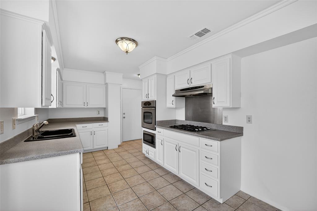 1744 Gross Road Dallas, TX 75228 - Photo 8 of 20 Beautiful Kitchen with Entry Door to Garage