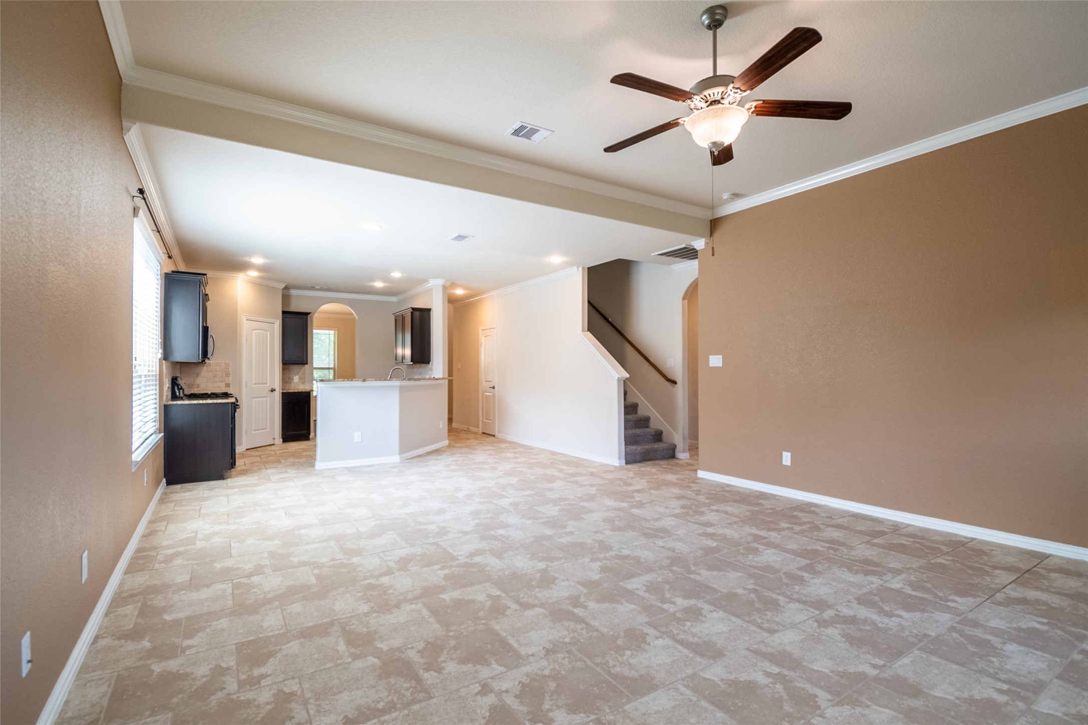 1610 Juniper Knoll Way Conroe, TX 77301 - Photo 12 of 41 a view of a kitchen with a sink and a kitchen