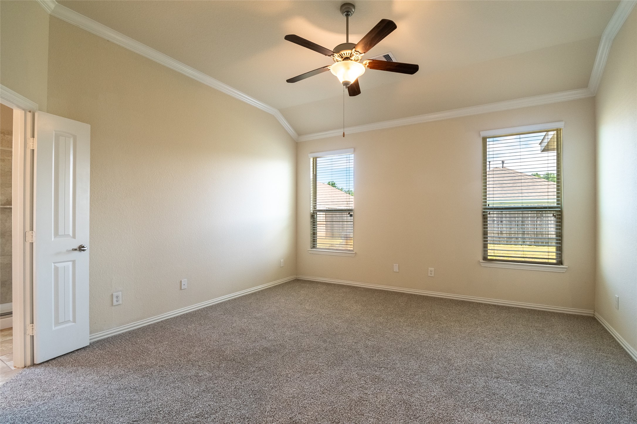 1610 Juniper Knoll Way Conroe, TX 77301 - Photo 20 of 41 a view of an empty room with a window