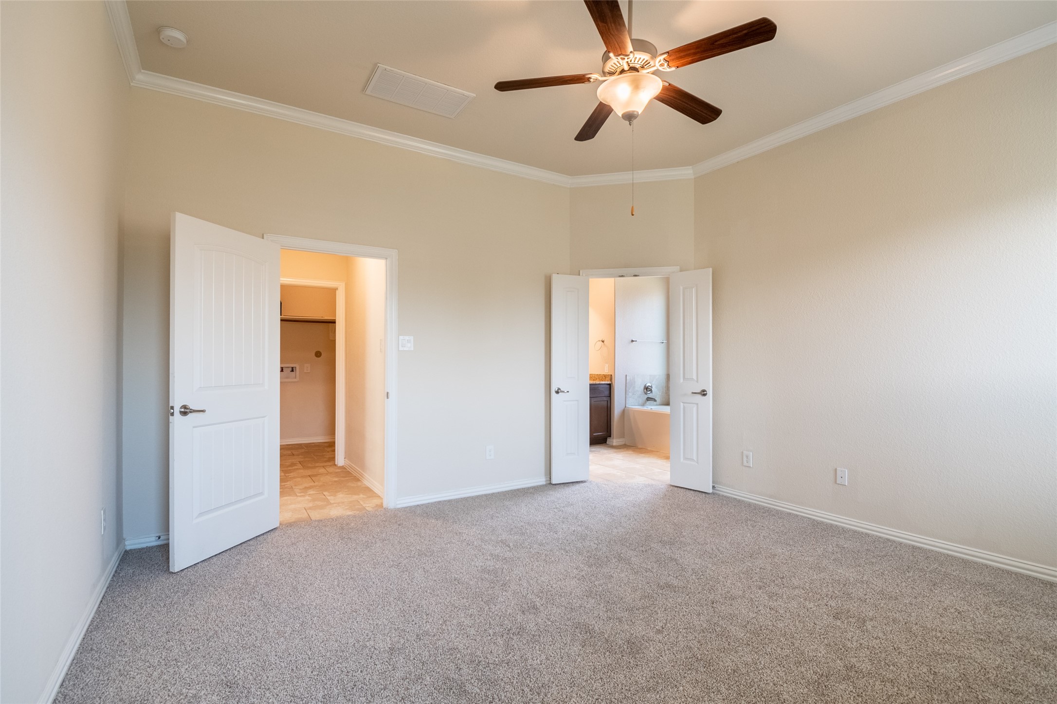 1610 Juniper Knoll Way Conroe, TX 77301 - Photo 21 of 41 a view of empty room with a ceiling fan