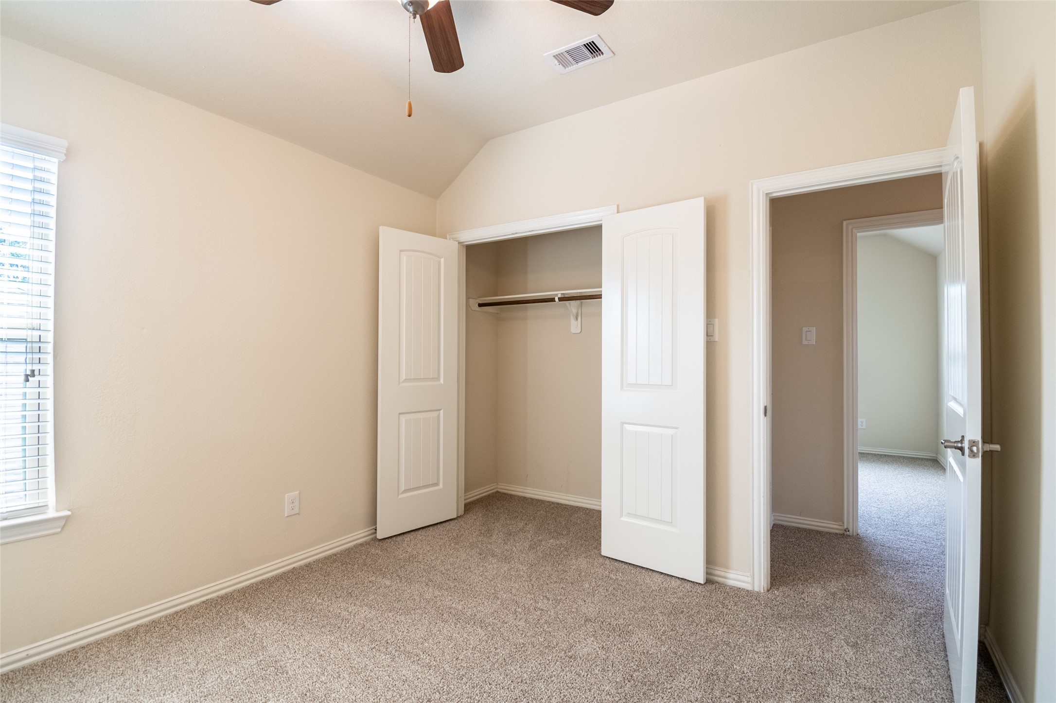 1610 Juniper Knoll Way Conroe, TX 77301 - Photo 35 of 41 an empty room with windows