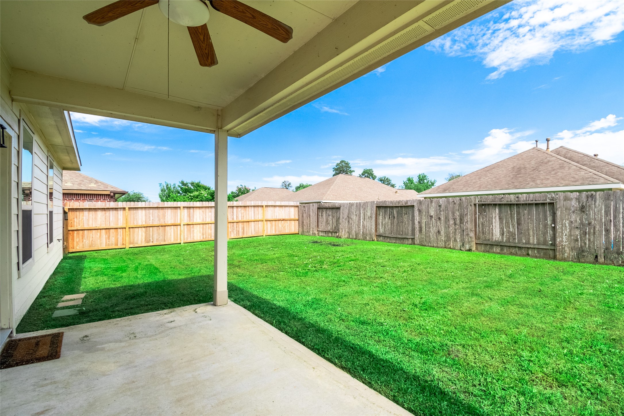 1610 Juniper Knoll Way Conroe, TX 77301 - Photo 37 of 41 a view of a backyard with a garden