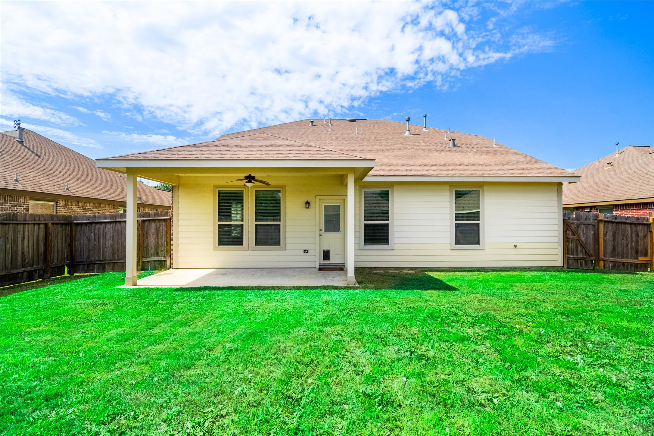 1610 Juniper Knoll Way Conroe, TX 77301 - Photo 38 of 41 a view of a house with a yard and sitting area