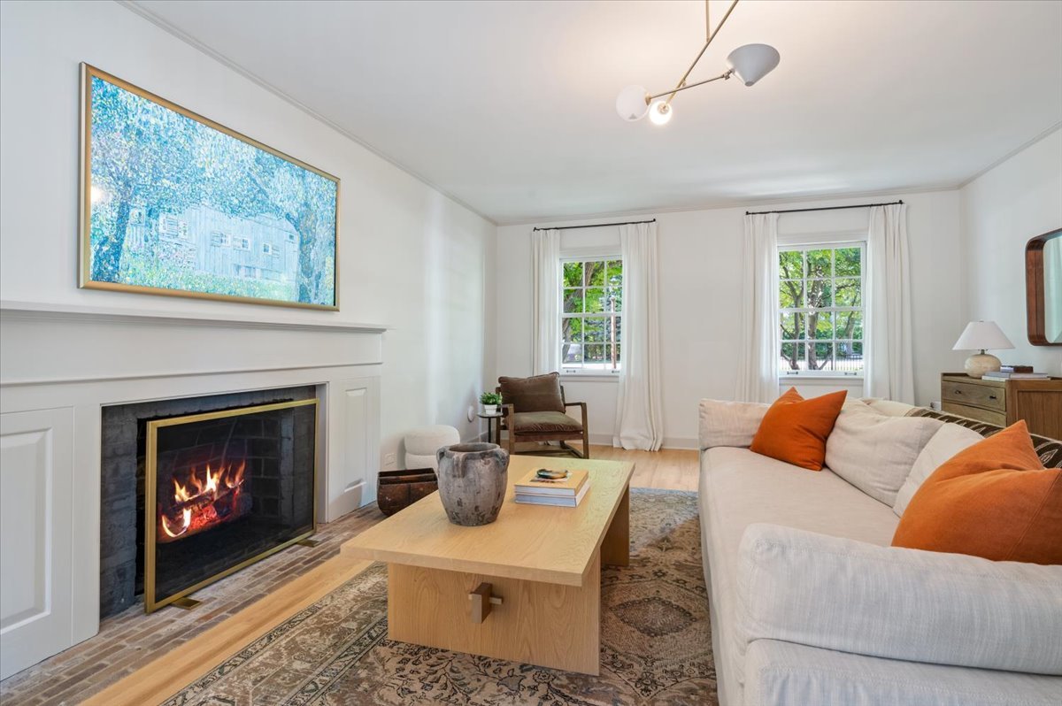 615 Ridge Road Kenilworth, IL 60043 - Photo 11 of 41 a living room with furniture a fireplace and windows