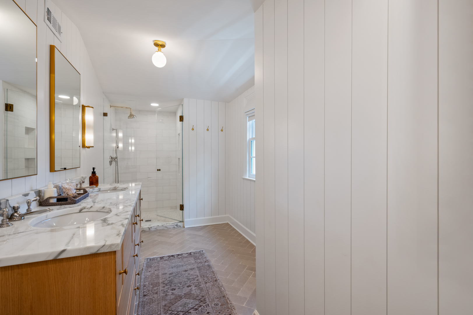 615 Ridge Road Kenilworth, IL 60043 - Photo 19 of 41 a bathroom with a sink and a mirror