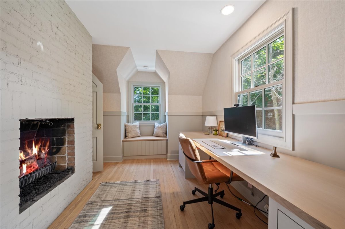 615 Ridge Road Kenilworth, IL 60043 - Photo 22 of 41 a view of a workspace with furniture and a window