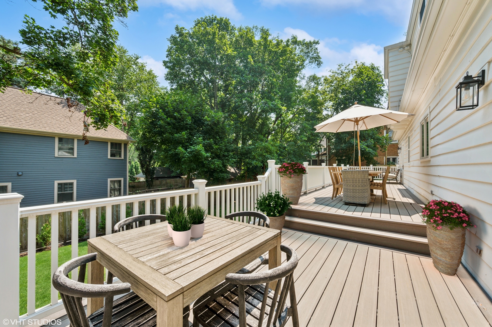 615 Ridge Road Kenilworth, IL 60043 - Photo 35 of 41 a view of a patio with a table and chairs