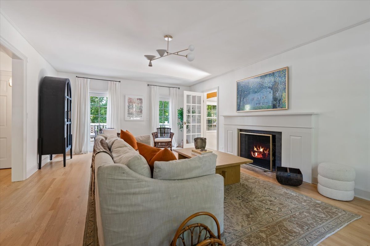 615 Ridge Road Kenilworth, IL 60043 - Photo 9 of 41 a living room with furniture and a fireplace