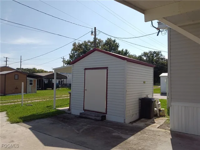 a bedroom with a bed and a cabinets