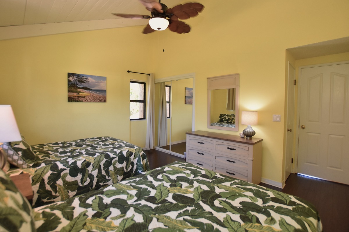 68-3840 Lua Kula Street, Unit D200 Waikoloa, HI 96738 - Photo 13 of 29 a bedroom with a bed and a dresser