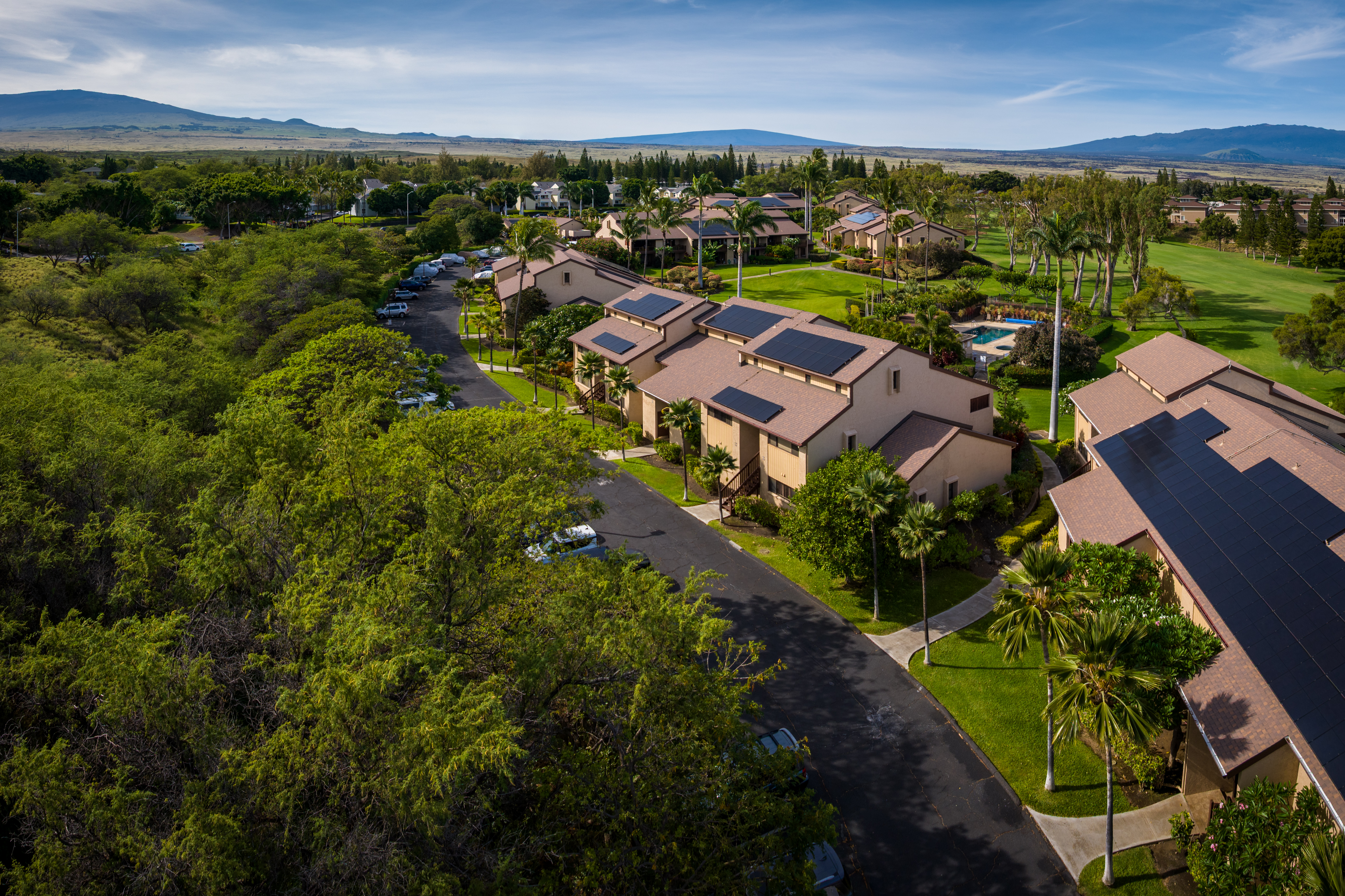 68-3840 Lua Kula Street, Unit D200 Waikoloa, HI 96738 - Photo 18 of 29 an aerial view of residential houses with outdoor space and trees