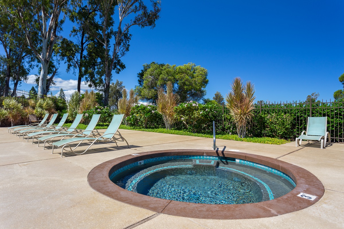 68-3840 Lua Kula Street, Unit D200 Waikoloa, HI 96738 - Photo 21 of 29 a view of a swimming pool with a yard