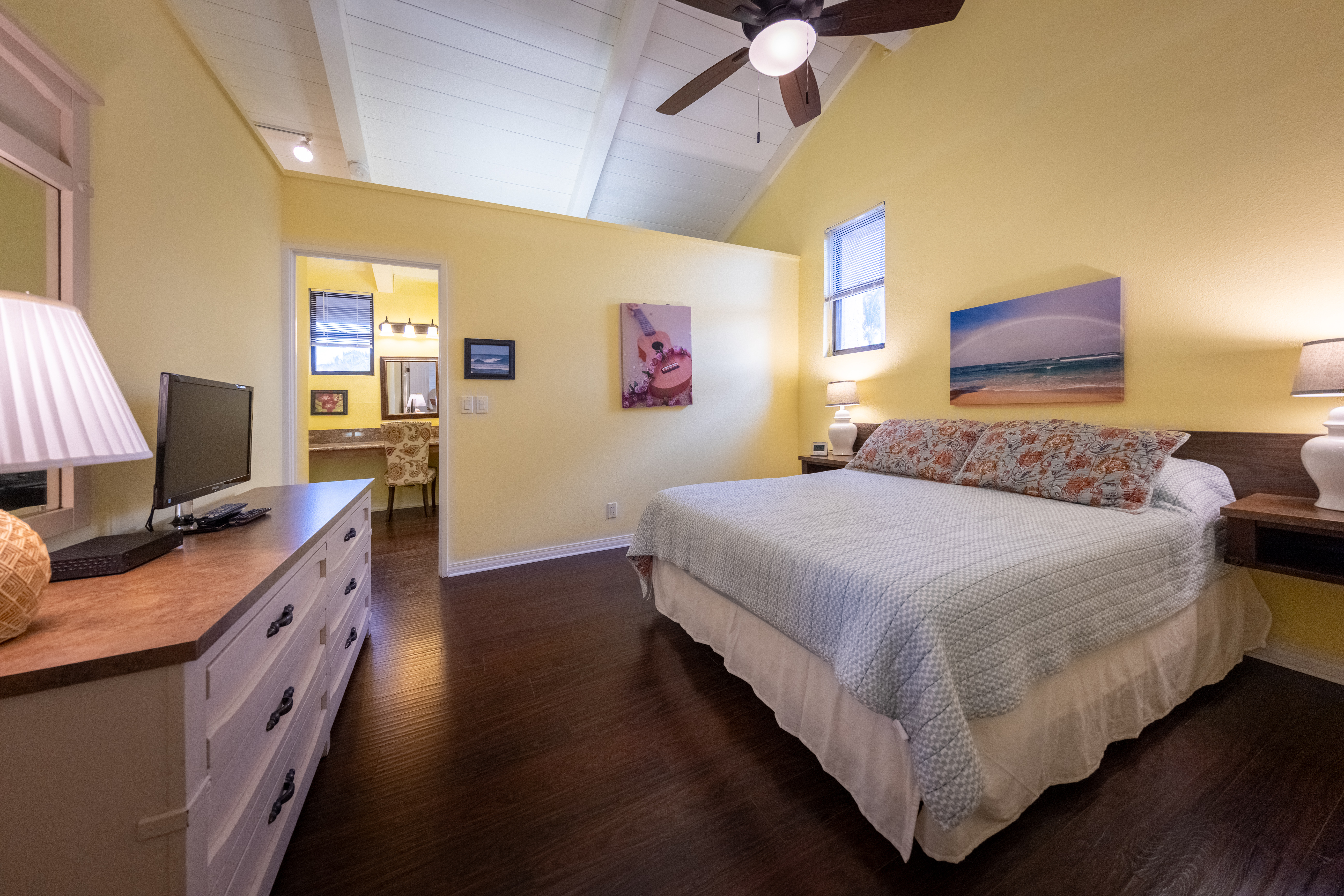 68-3840 Lua Kula Street, Unit D200 Waikoloa, HI 96738 - Photo 6 of 29 a bedroom with a bed and a flat screen tv