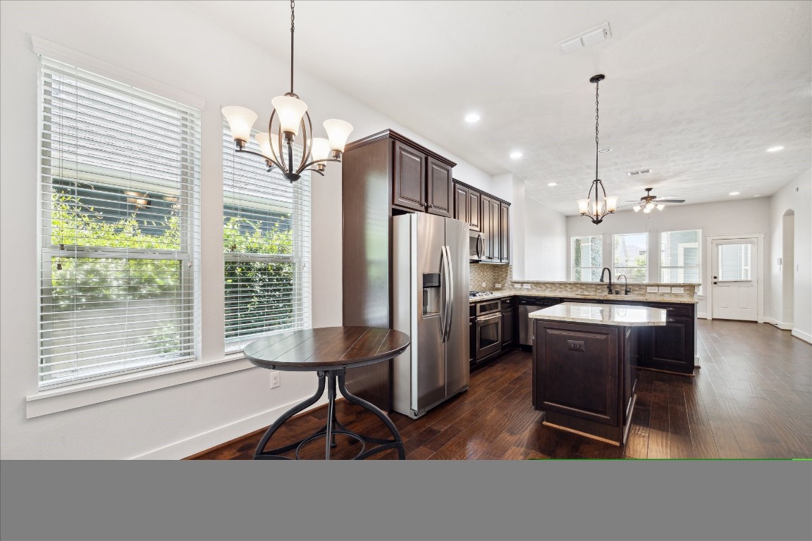 17011 Seminole Ridge Drive Cypress, TX 77433 - Photo 11 of 33 Spacious kitchen with connecting breakfast all overlooking the living room space