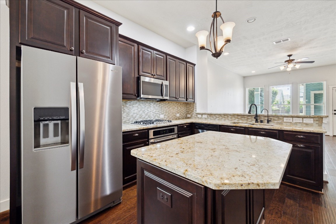 17011 Seminole Ridge Drive Cypress, TX 77433 - Photo 12 of 33 The kitchen offers Frigidaire stainless steel appliances and plenty of granite counter space