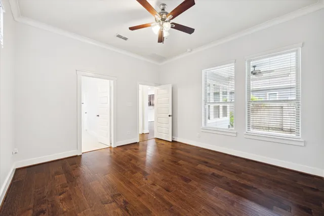 a bathroom with a granite countertop sink mirror and a bathtub