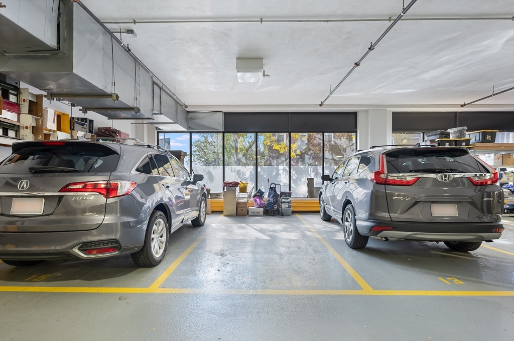 36 A Street, Unit 5D Boston, MA 02127 - Photo 13 of 13 a car parked in garage