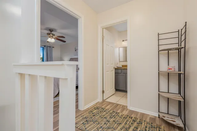 a kitchen with a refrigerator and cabinets