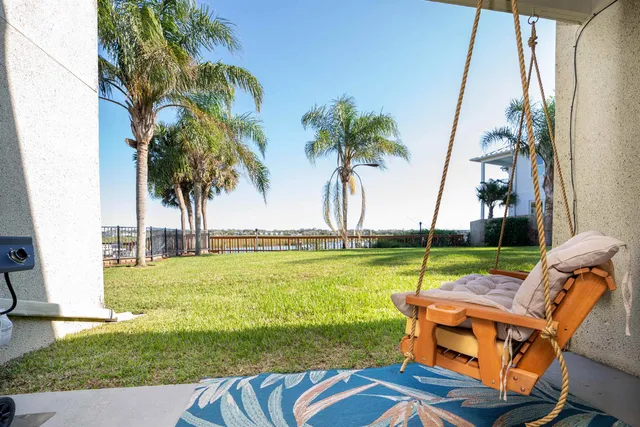 a view of an outdoor space with seating area and swimming pool
