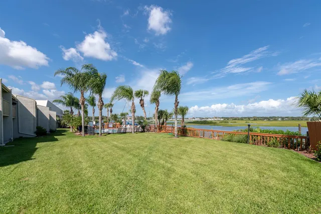 a view of a patio with swimming pool of the house
