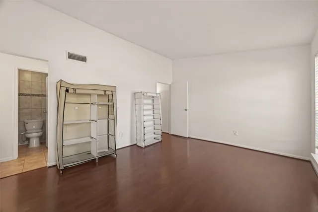 a bathroom with a sink a light fixture and a mirror