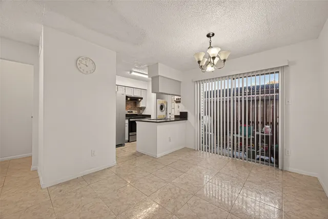 a view of a kitchen with a sink