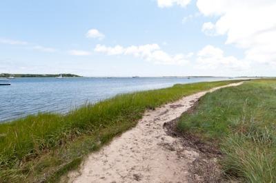 74 Sears Point Road Chatham, MA 02633 - Photo 16 of 21 a view of a lake with a big yard