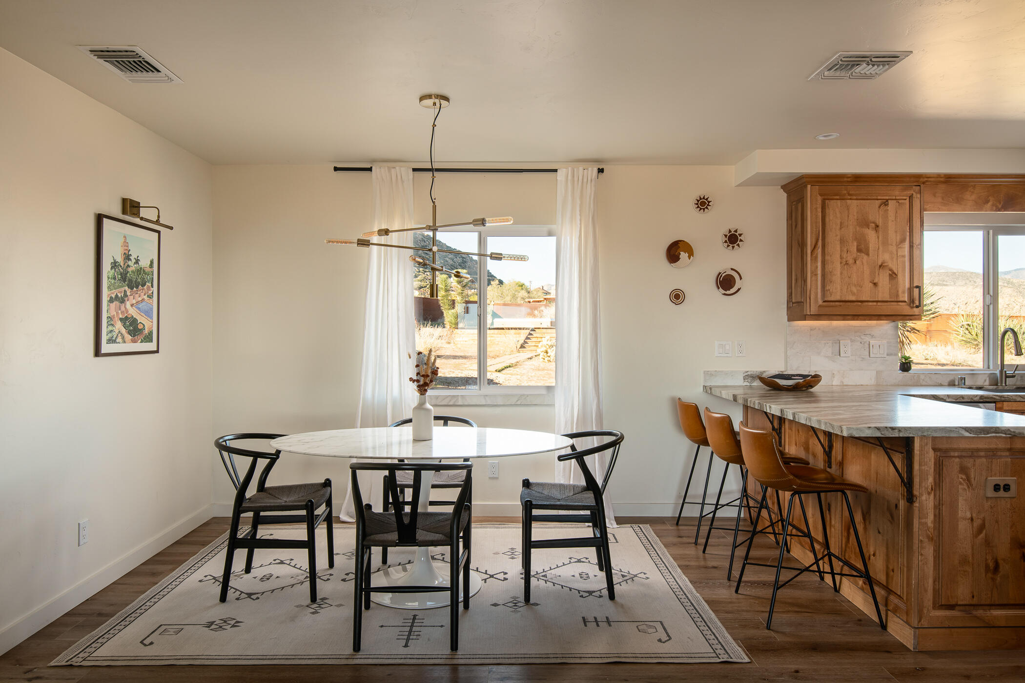 5544 Roy Rogers Road Pioneertown, CA 92268 - Photo 11 of 35 a view of a dining room with furniture and window