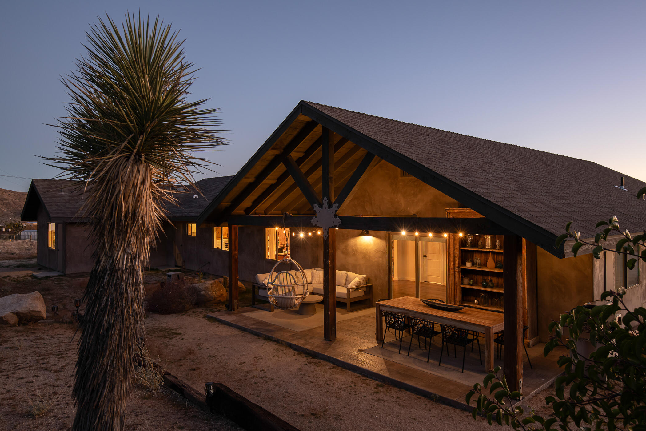 5544 Roy Rogers Road Pioneertown, CA 92268 - Photo 16 of 35 a view of a backyard with a tub