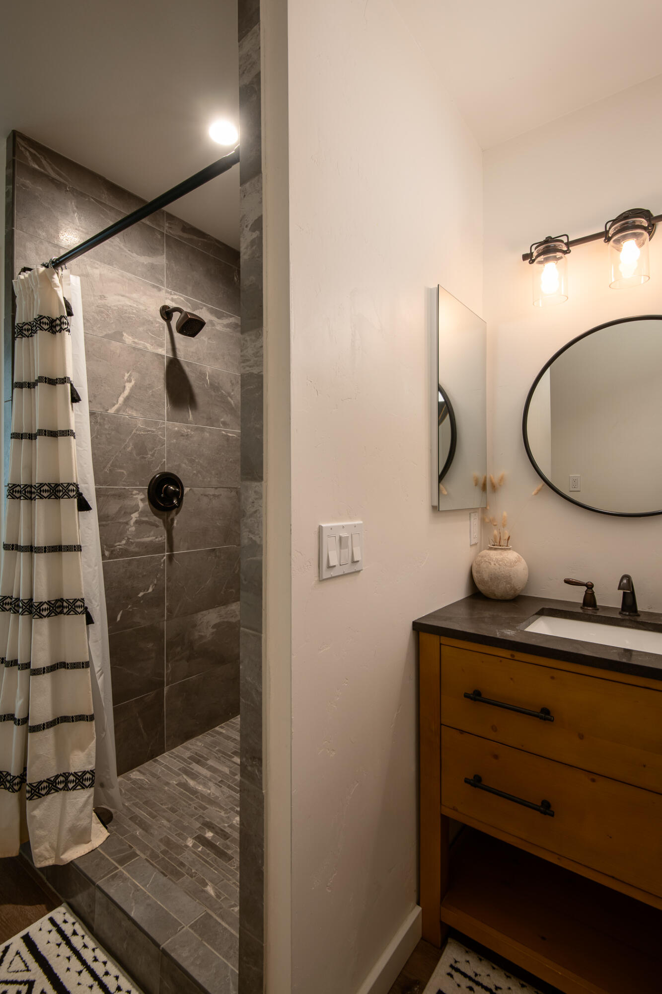 5544 Roy Rogers Road Pioneertown, CA 92268 - Photo 21 of 35 a bathroom with a sink mirror and shower