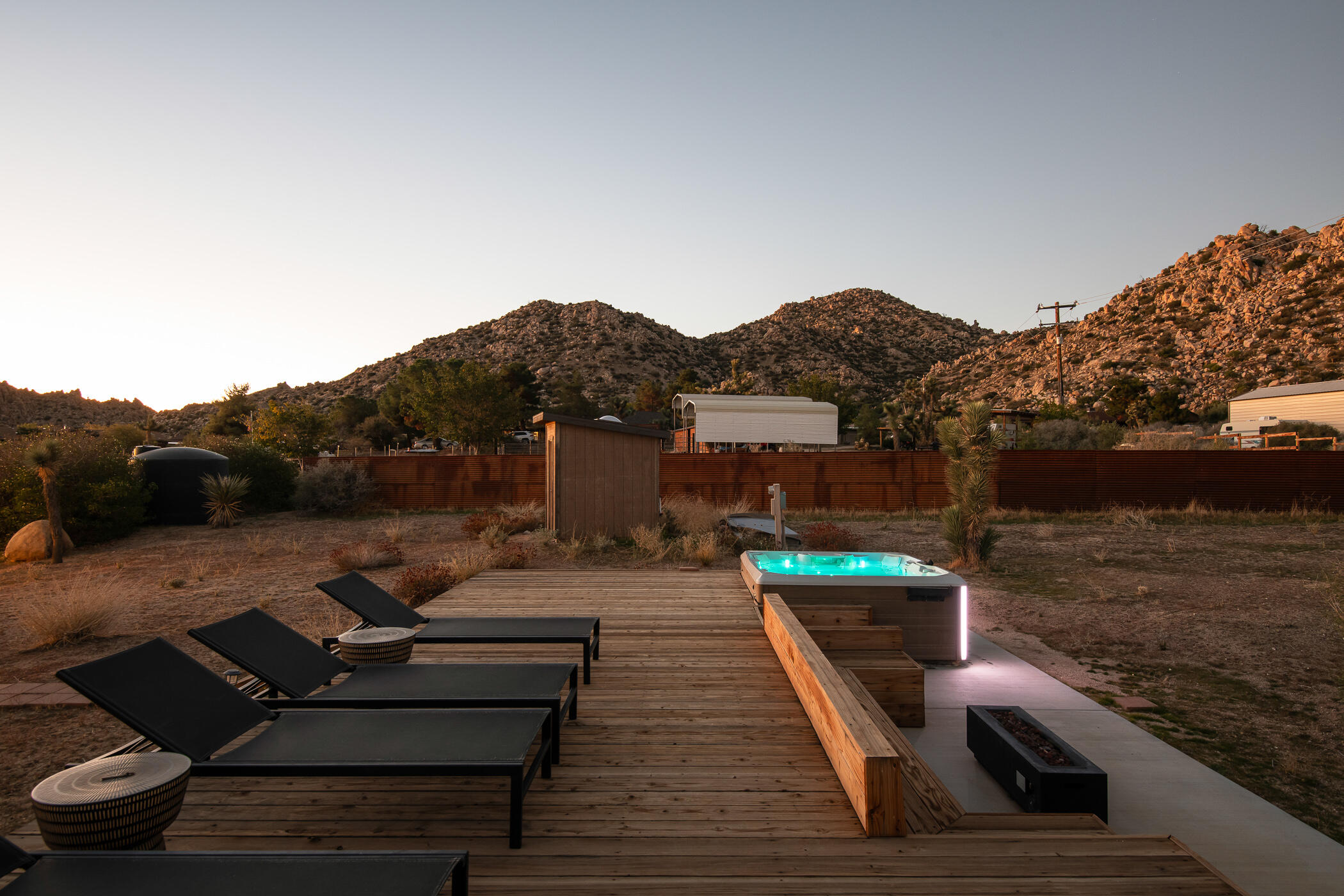 5544 Roy Rogers Road Pioneertown, CA 92268 - Photo 34 of 35 a view of a terrace with furniture and a yard