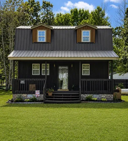 a view of a house with a back yard