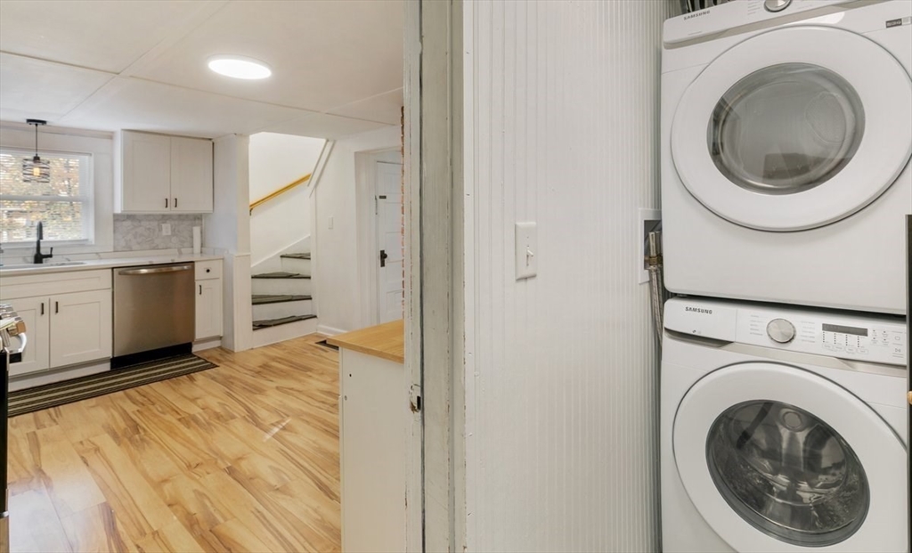 80 Brandy Brow Road Haverhill, MA 01830 - Photo 15 of 33 a bedroom with a washer and dryer