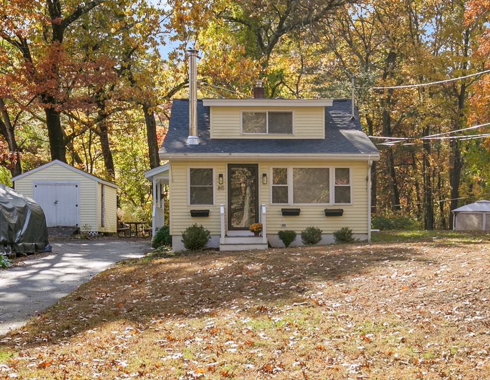 80 Brandy Brow Road Haverhill, MA 01830 - Photo 2 of 33 a front view of a house with a yard