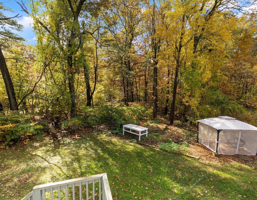 80 Brandy Brow Road Haverhill, MA 01830 - Photo 21 of 33 a backyard of a house with table and chairs