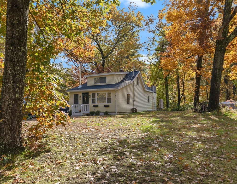 80 Brandy Brow Road Haverhill, MA 01830 - Photo 3 of 33 a house that has a tree in front of it