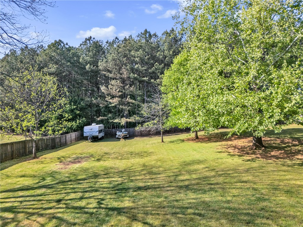 154 Hammond School Road Anderson, SC 29621 - Photo 28 of 33 Expansive green yard provides a serene natural retreat.