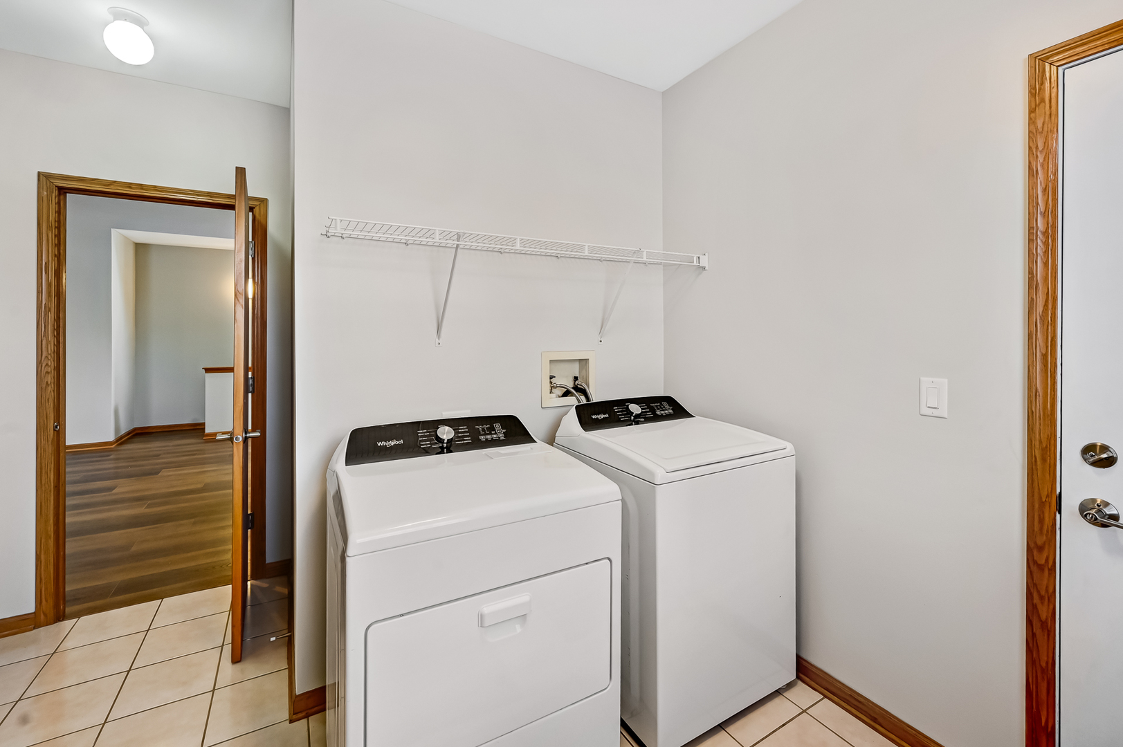 1938 Manning Road Darien, IL 60561 - Photo 12 of 23 a utility room with dryer and washer