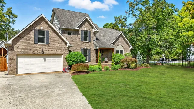 a view of house with garden spaces