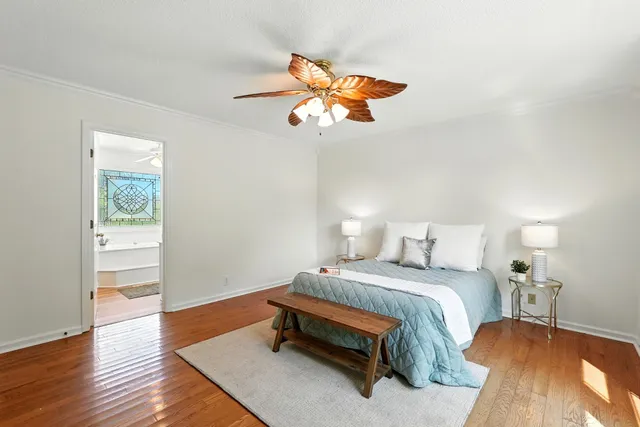 a view of living room with furniture and wooden floor