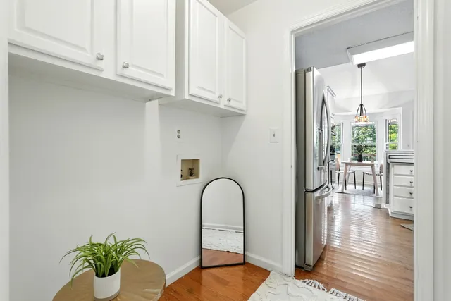 a view of a livingroom with a hardwood floor