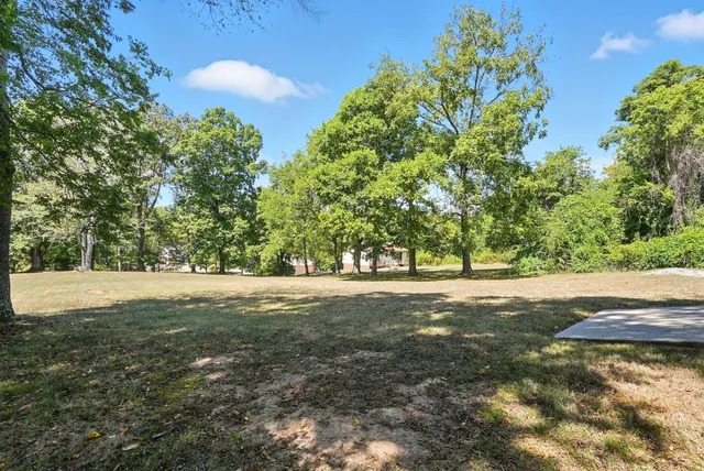 a picture of a wall with a white wall and sign