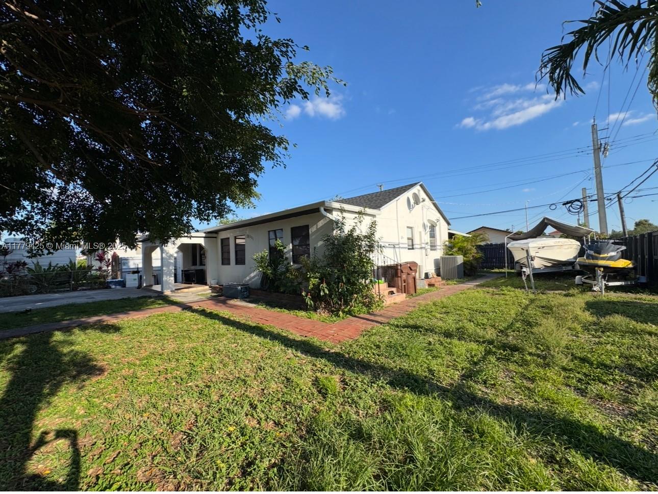 602 East 50th Street Hialeah, FL 33013 - Photo 20 of 20 a view of a house with backyard and sitting area