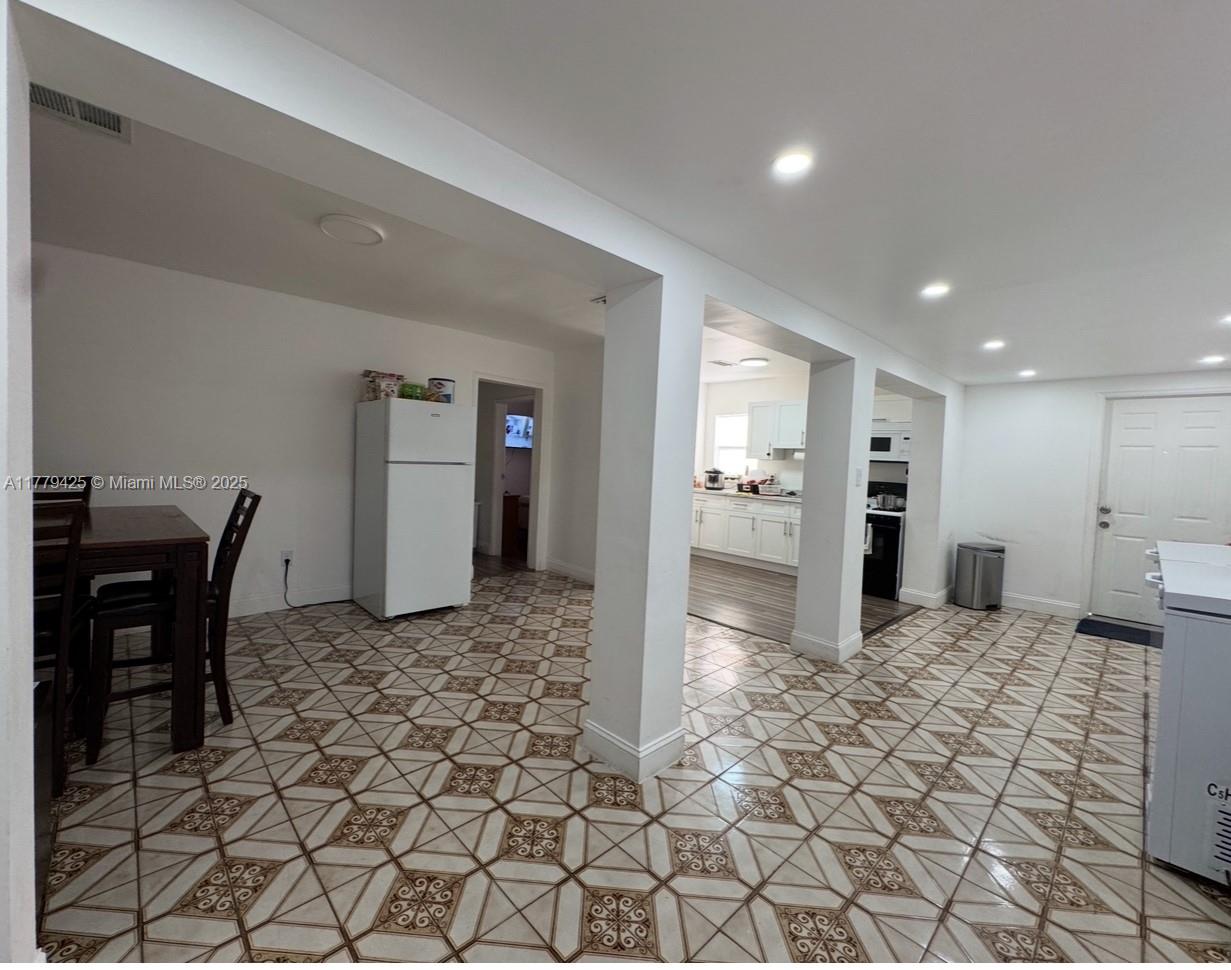 602 East 50th Street Hialeah, FL 33013 - Photo 4 of 20 a view of a electric appliances and dining room in a house