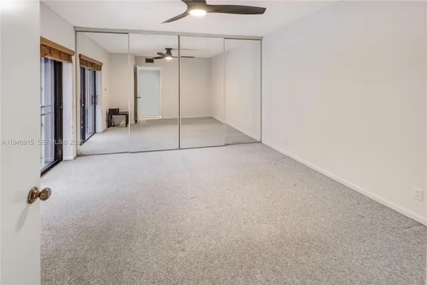 a bathroom with a tub and shower