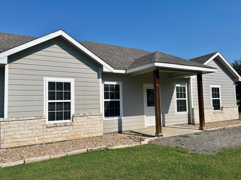 1905 County Road 429 Cleburne, TX 76031 - Photo 1 of 1 a front view of a house with a yard