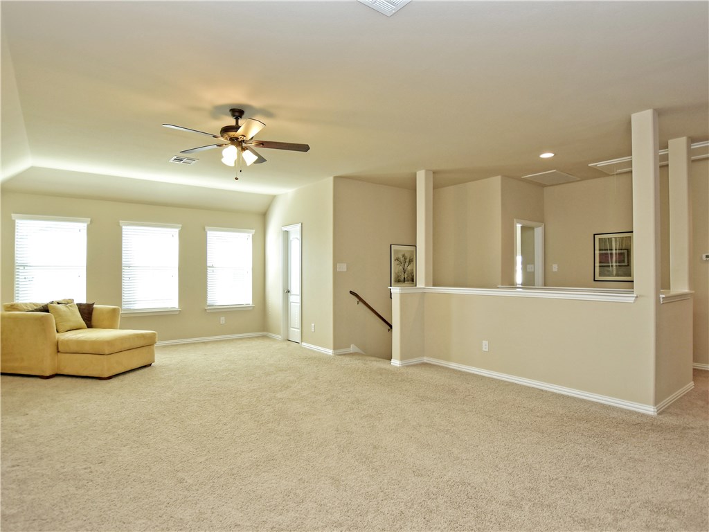 607 Hot Spring Valley Buda, TX 78610 - Photo 1 of 1 Very large game room with ceiling fan - plenty of room for all the kids' toys!